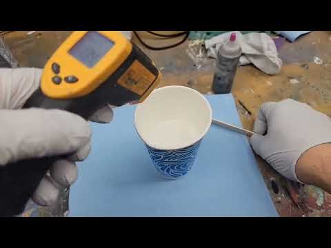 Glass microballoon water purge